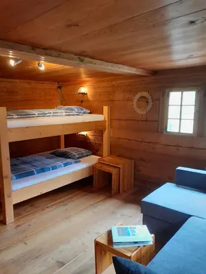 Ein Bett oder Betten in einem Zimmer der Unterkunft Saflischgarten