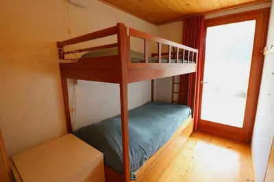 Ein Bett oder Betten in einem Zimmer der Unterkunft Chalet Kiri 8 personnes Sur les hauteurs d Evolene