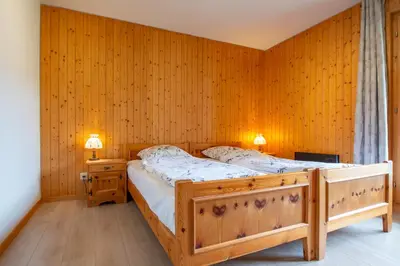 Ein Bett oder Betten in einem Zimmer der Unterkunft Chalet Mon Reve