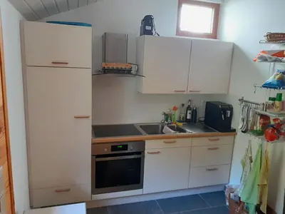 Küche/Küchenzeile in der Unterkunft Hüsi