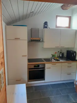 Küche/Küchenzeile in der Unterkunft Hüsi