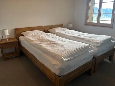 Ein Bett oder Betten in einem Zimmer der Unterkunft Apartment Bärgli in Krattigen