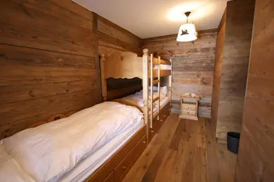 Ein Bett oder Betten in einem Zimmer der Unterkunft Alouette