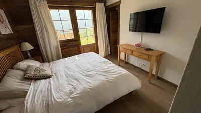 Ein Bett oder Betten in einem Zimmer der Unterkunft Jean