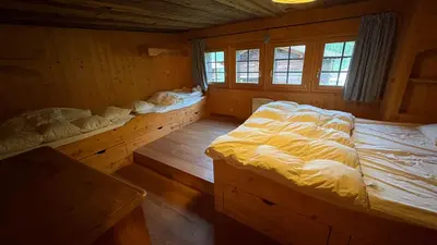 Ein Bett oder Betten in einem Zimmer der Unterkunft Ourson