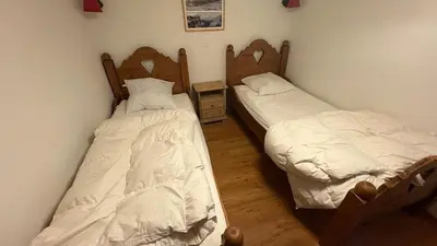 Ein Bett oder Betten in einem Zimmer der Unterkunft Ourson