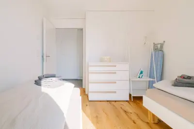 Ein Bett oder Betten in einem Zimmer der Unterkunft Apartment Mönch in See- und Bergnähe, modern, mit Balkon, 4 Gäste