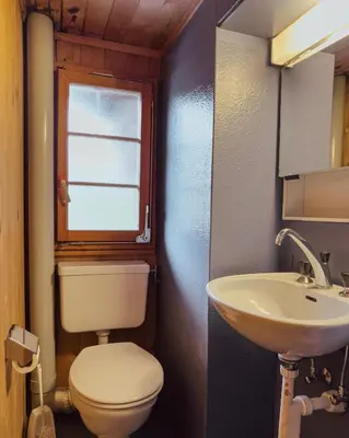 Ein Badezimmer in der Unterkunft Chalet Brauerei