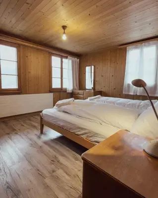 Ein Bett oder Betten in einem Zimmer der Unterkunft Chalet Brauerei