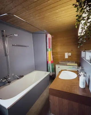 Ein Badezimmer in der Unterkunft Chalet Brauerei