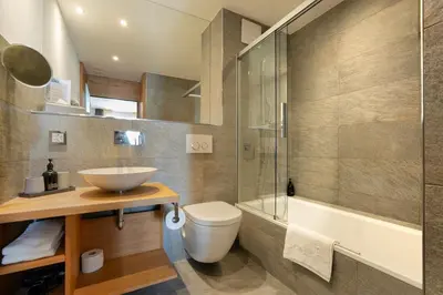 Ein Badezimmer in der Unterkunft Apartment Crown Andermatt-2