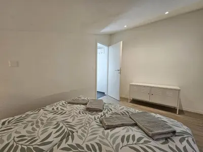 Ein Bett oder Betten in einem Zimmer der Unterkunft Adora