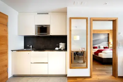 Ein Bett oder Betten in einem Zimmer der Unterkunft Apartment Crown Andermatt-16