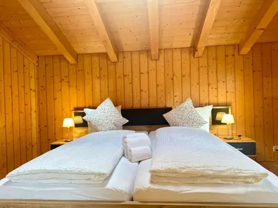 Ein Bett oder Betten in einem Zimmer der Unterkunft Chalet with Scenic Valley & Mountain Views