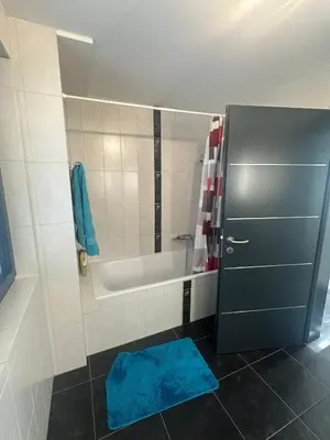 Ein Badezimmer in der Unterkunft Chambres dans villa à 10 minutes de Crans-Montana