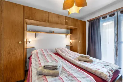 Ein Bett oder Betten in einem Zimmer der Unterkunft Anemones 15 - 7 pers - centre & piscine