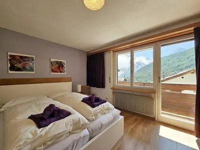 Ein Bett oder Betten in einem Zimmer der Unterkunft Cresta 4