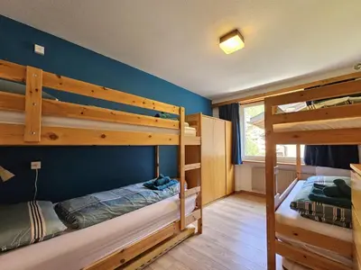 Ein Bett oder Betten in einem Zimmer der Unterkunft Cresta 4