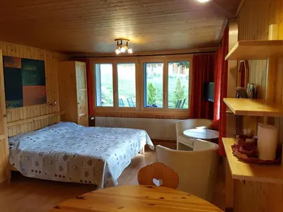 Ein Bett oder Betten in einem Zimmer der Unterkunft Chalet Florida