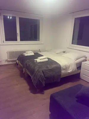 Ein Bett oder Betten in einem Zimmer der Unterkunft Le rocher