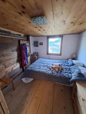 Ein Bett oder Betten in einem Zimmer der Unterkunft Appartement Valaisan typique
