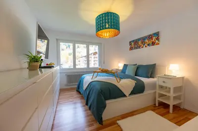 Ein Bett oder Betten in einem Zimmer der Unterkunft Le Belvédère de Loèche