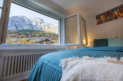 Ein Bett oder Betten in einem Zimmer der Unterkunft Le Belvédère de Loèche