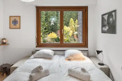 Ein Bett oder Betten in einem Zimmer der Unterkunft Crans-Montana - Appartement ski-in & ski-out, 4 pers