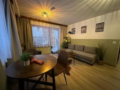 Ein Sitzbereich in der Unterkunft Haus Silence - Berge & Sonne im Saastal Ski Wandern Familie Haustiere