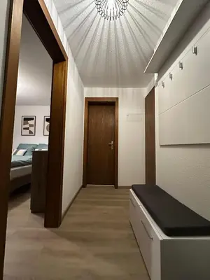 Ein Bett oder Betten in einem Zimmer der Unterkunft Haus Silence - Berge & Sonne im Saastal Ski Wandern Familie Haustiere