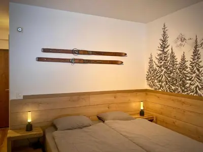 Ein Bett oder Betten in einem Zimmer der Unterkunft Cozy studio Leukerbad!
