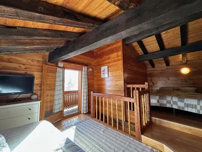 Ein Bett oder Betten in einem Zimmer der Unterkunft PO Petite Ourses Suite - Anzere Slopeside - Swiss Alp