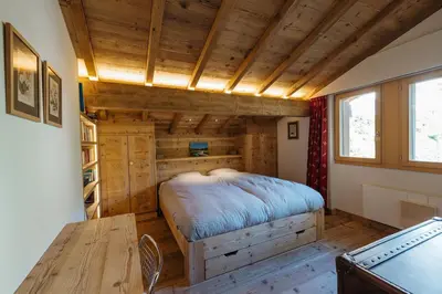 Ein Bett oder Betten in einem Zimmer der Unterkunft 3 bedroom apartment - Crans-Montana