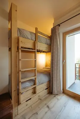 Ein Bett oder Betten in einem Zimmer der Unterkunft 3 bedroom apartment - Crans-Montana