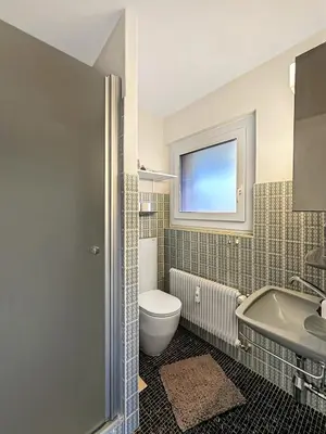 Ein Badezimmer in der Unterkunft Alpine Vista - Next to the Cable car - Swiss Alps