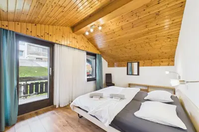 Ein Bett oder Betten in einem Zimmer der Unterkunft Central Apartment for 6 the Heart of Saas-Fee