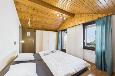 Ein Bett oder Betten in einem Zimmer der Unterkunft Central Apartment for 6 the Heart of Saas-Fee
