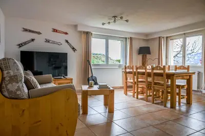 Ein Sitzbereich in der Unterkunft Le Cerisier