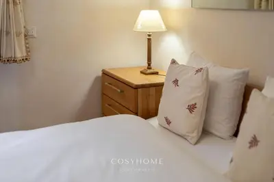 Ein Bett oder Betten in einem Zimmer der Unterkunft Le Saint Georges l Jardin et vue l By CosyHome