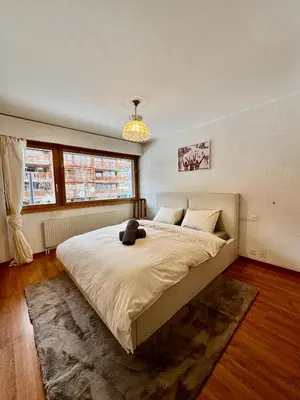 Ein Bett oder Betten in einem Zimmer der Unterkunft magnifique appartement au centre de Montana