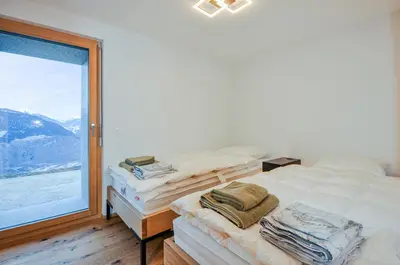 Ein Bett oder Betten in einem Zimmer der Unterkunft Chalet 