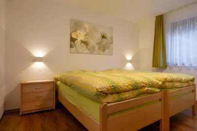 Ein Bett oder Betten in einem Zimmer der Unterkunft Haus Amici