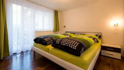 Ein Bett oder Betten in einem Zimmer der Unterkunft Bergheimat