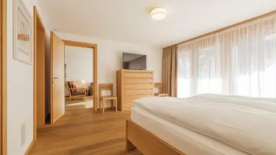 Ein Bett oder Betten in einem Zimmer der Unterkunft Haus Zur Matte by Zermatt Premium Apartments