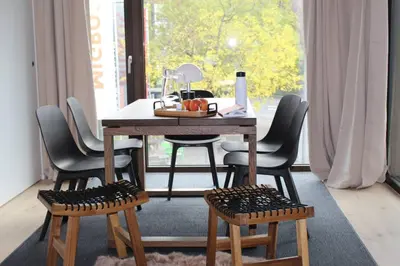 Ein Sitzbereich in der Unterkunft Modern Apartment with Balcony and BBQ at Interlaken West Station