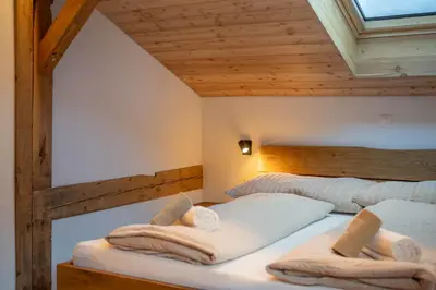 Ein Bett oder Betten in einem Zimmer der Unterkunft Stadel Alpenstern mit Wellnessbereich