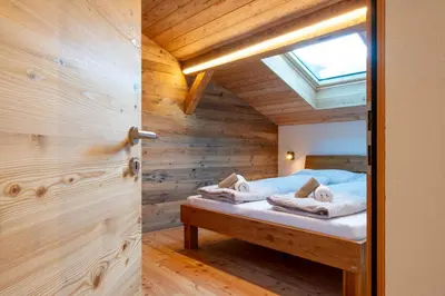 Ein Bett oder Betten in einem Zimmer der Unterkunft Stadel Alpenstern mit Wellnessbereich