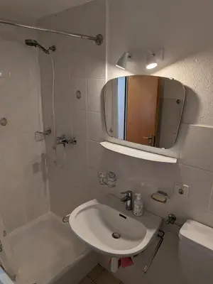 Ein Badezimmer in der Unterkunft Family friendly and sunny apartment in the heart of Saas Grund