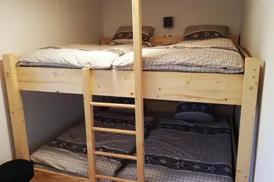 Ein Bett oder Betten in einem Zimmer der Unterkunft Chalet les Anémones