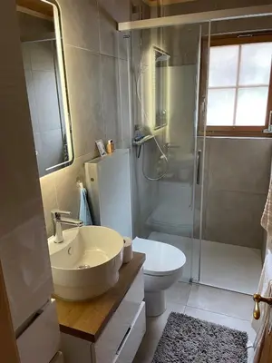 Ein Badezimmer in der Unterkunft Chalet Kuckuk including Studio
